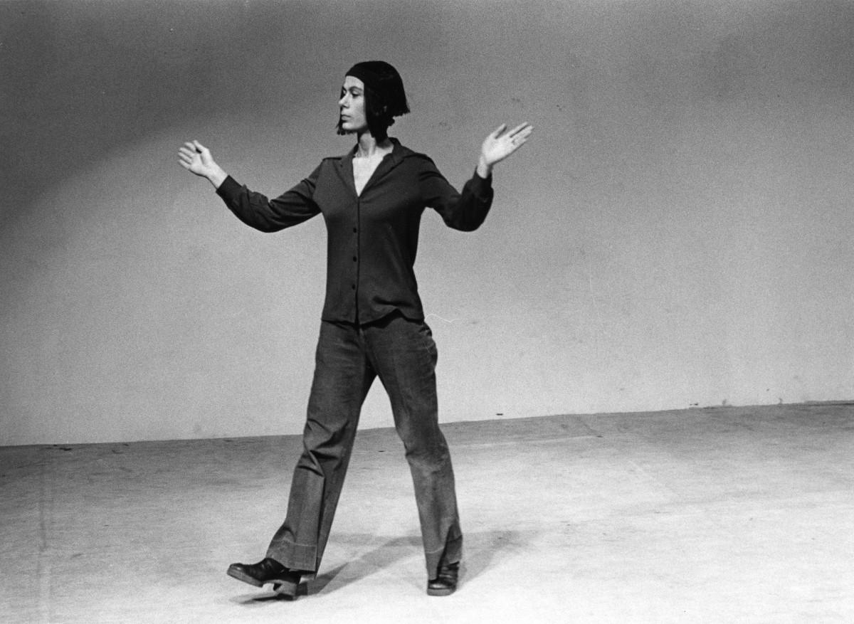 Babette Mangolte. Yvonne Rainer dancing her solo “Trio A”, in the performance “Story about a woman who…”, Theater for the New City on Jane Street, New York City, 1973. Courtesy Babette Mangolte.