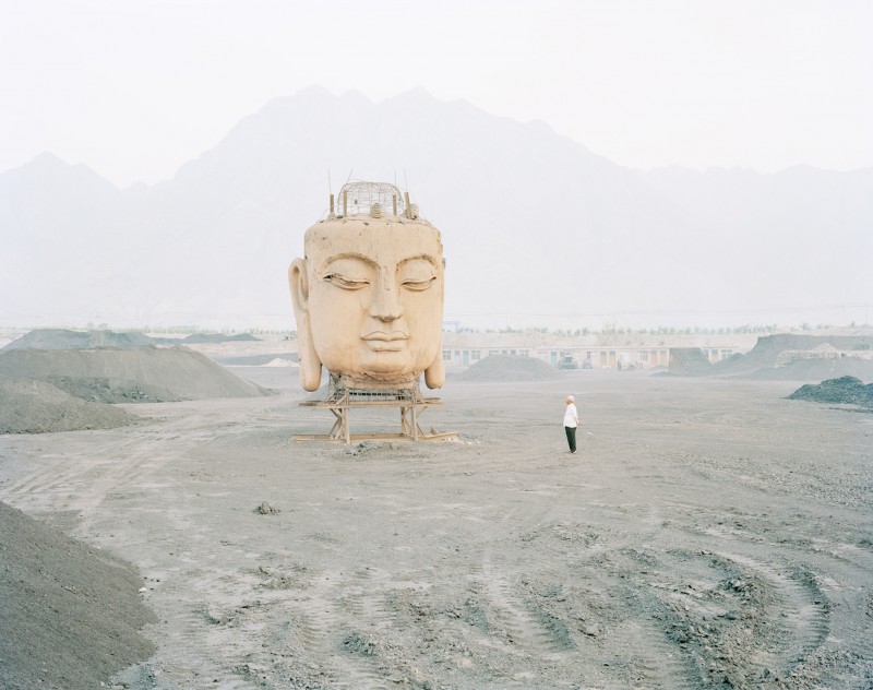 Kechun Zhang, Buddha in Coal Yard, Ningxia Province, 2011.