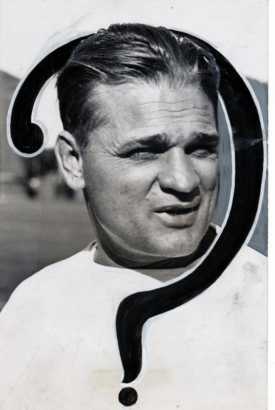 Press photo of Harry G. Kipke, trainer of American football team the Michigan Wolverines, 1935.