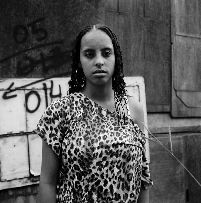 Ludovic Carème, Suelen in front of her house, Favela Agua Branca, São Paulo, 2009. Courtesy of the artist.