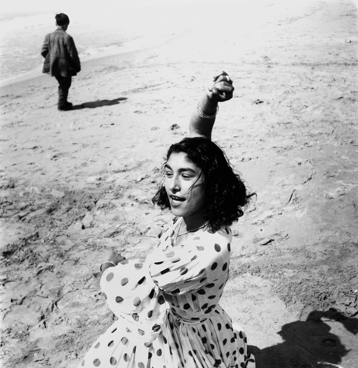 Lucien Clergue. Draga in a Polka Dot Dress, Saintes-Maries-de-la-Mer, 1957. Courtesy of the Atelier Lucien Clergue.