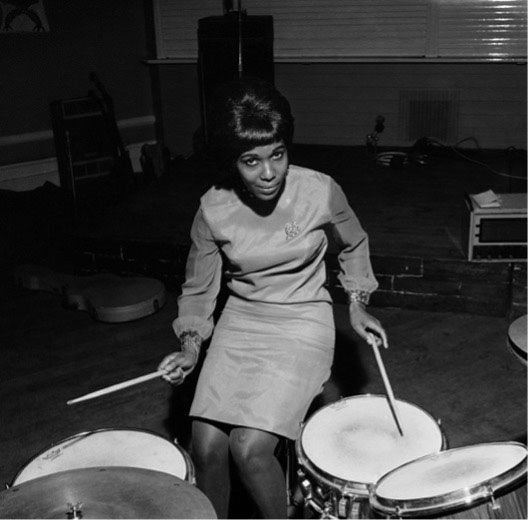 James Barnor, Constance Mulondo, Drum model, at London University Weekend with the band The Millionaires, London, 1967. Courtesy of the artist.