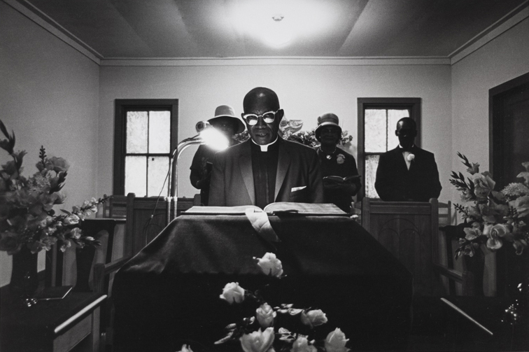 Minister reads from Bible,Johns Island, SC, 1965