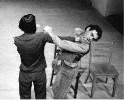 yvonne-rainer-sthis-is-the-story-of-a-woman-whos-s-slow-motion-fight-yvonne-hist-john-on-his-chin